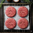 Ground beef patties ready to grill.webp